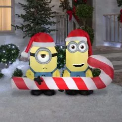 Gemmy Airblown Inflatable Minions Carrying Candy Cane -Deals Gemmy Store 1572850 A1